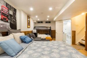 a bedroom with a bed and a living room at BIG Oasis Studio near Airport YYZ in Toronto