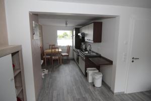Kuchyň nebo kuchyňský kout v ubytování Ferienwohnung Margot