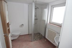 Koupelna v ubytování Ferienwohnung Margot + 17 fotografií