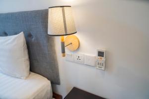 Postel nebo postele na pokoji v ubytování Marvelinn Siem Reap