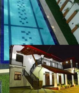 een foto van een huis en een zwembad bij Brisa Marina in Negombo