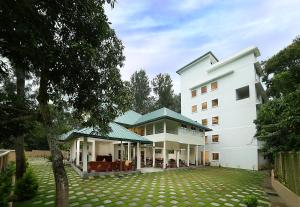 Aed väljaspool majutusasutust Peppervine Hotel