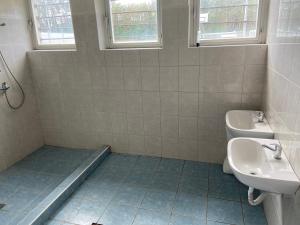 a bathroom with a sink and a toilet at Soukeník FCT in Sezimovo Ústí