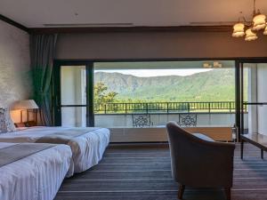 Postel nebo postele na pokoji v ubytování Hakone Sengokuhara Prince Hotel + 37 fotografií