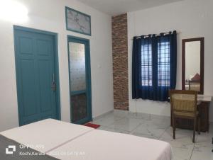Guestland Homestay客房内的一张或多张床位