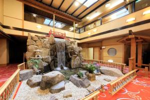 Foto sihtkohas Komaba asuva majutusasutuse 湯元ホテル阿智川 galeriist