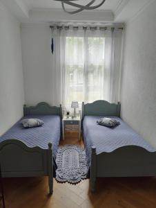 Ένα ή περισσότερα κρεβάτια σε δωμάτιο στο Esplanaadi Luxury Apartment