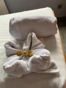 Postel nebo postele na pokoji v ubytování Hotel Carbayon