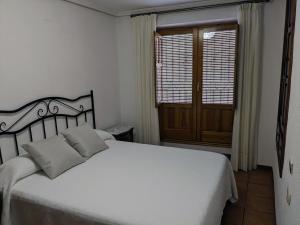 Cama o camas de una habitación en Casa Malena - Biar