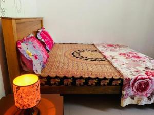 Кровать или кровати в номере Indusara Villa Bentota