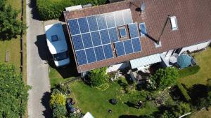 an overhead view of a house with a solar panel on the roof at Nr 28 - Ferienwohnung Am Yachthafen in Harlesiel