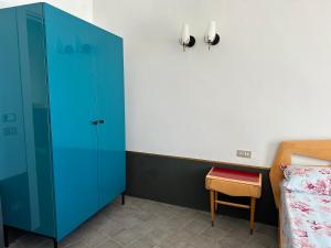 Postel nebo postele na pokoji v ubytování AccalmiA