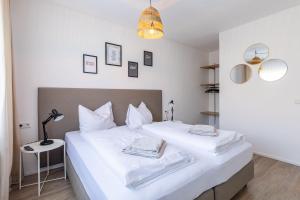Postel nebo postele na pokoji v ubytování Appartements DAS RETTENBACHER