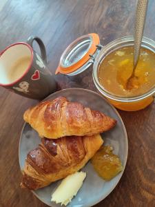 a plate of food with a pastry and a cup of coffee at La Scierie in Quillan +24 photos
