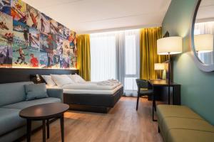Postel nebo postele na pokoji v ubytování Thon Hotel Snø