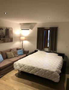 Postel nebo postele na pokoji v ubytování Le Lac Bleu huis 18