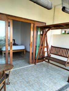 Balkon lub taras w obiekcie Dharma Yoga Homestay dan hostel