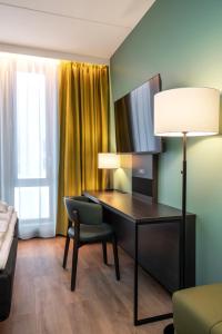 Postel nebo postele na pokoji v ubytování Thon Hotel Snø