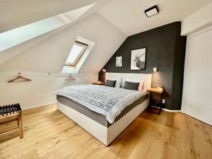 Postel nebo postele na pokoji v ubytování Molinaro Apartmány Jeseníky