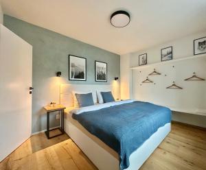 Postel nebo postele na pokoji v ubytování Molinaro Apartmány Jeseníky