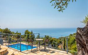 a villa with a view of the ocean at Sun And Stone in Athani
