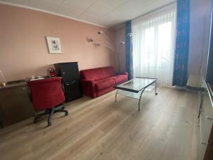 Posezení v ubytování Hôtel de la Gare
