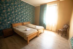 Letto o letti in una camera di Strawberry