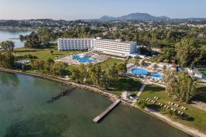 an aerial view of a resort and the water at Kerkyra Blue Hotel & Spa by Louis Hotels in Corfu Town