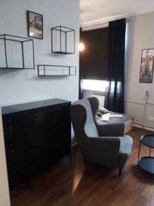 Art Dreams Apartament Chmielna 14 tesisinde bir oturma alanı