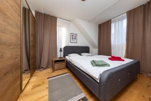 Postel nebo postele na pokoji v ubytování Apartmán JUH