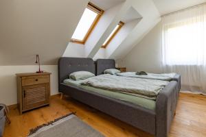 Postel nebo postele na pokoji v ubytování Apartmán JUH + 37 fotografií