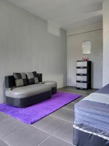 Posezení v ubytování RINA Guest House Pacitan