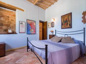 a bedroom with a bed in a room at La Loggia Sul Nera in Arrone