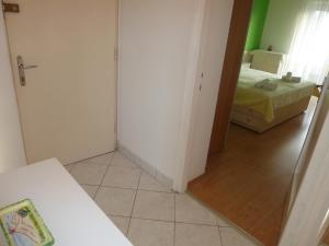 Postel nebo postele na pokoji v ubytování Apartment Marina