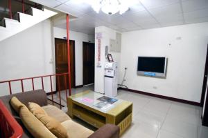 TV a/nebo společenská místnost v ubytování 大新民宿Da Xin Homestay