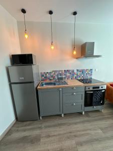 Dapur atau dapur kecil di Résidence le Marcadieu +62 gambar