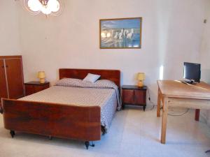Tempat tidur dalam kamar di SE021 Senigallia, trilocale in zona riservata