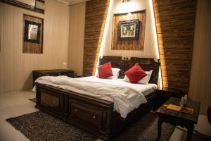 Postel nebo postele na pokoji v ubytování Ambala Haveli + 20 fotografií