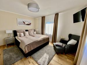 Postel nebo postele na pokoji v ubytování Haus-Holiday-Ferienhaus-in-Bad-Sachsa
