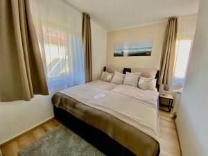 Postel nebo postele na pokoji v ubytování Haus-Holiday-Ferienhaus-in-Bad-Sachsa