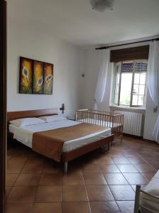 Postel nebo postele na pokoji v ubytování Contrada Macchia B&B + 37 fotografií