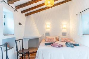 Postel nebo postele na pokoji v ubytování Casa Moum + 30 fotografií