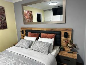 Un pat sau paturi într-o cameră la Magma Paraiso Royal