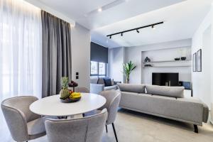 Khu vực ghế ngồi tại The Kokoon Volos Comfort Living