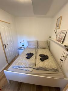 Postel nebo postele na pokoji v ubytování Bánhiday M4 Weekendhouse
