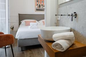 Postel nebo postele na pokoji v ubytování Be Your Home - Riviera Suites + 31 fotografií