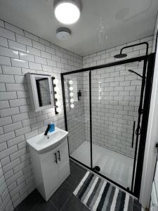 Phòng tắm tại Amani Apartments - Glasgow City Centre +95 ảnh
