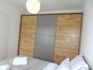 Posteľ alebo postele v izbe v ubytovaní Well-equipped apartment with free parking