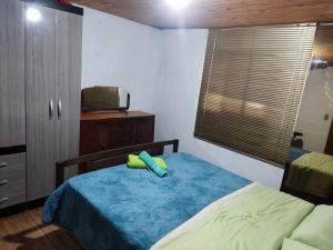 מיטה או מיטות בחדר ב-Casa, para máximo 6 personas