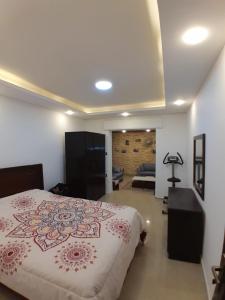 Postel nebo postele na pokoji v ubytování MK2 - One Bedroom Apartment